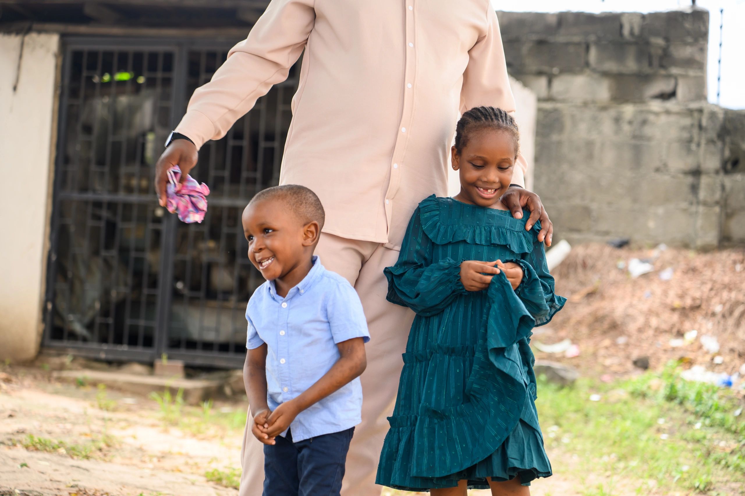 Family-friendly festival moment with children smiling outdoors